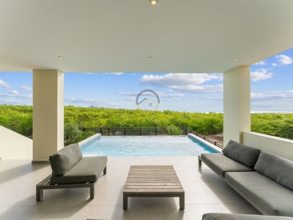 Moderne woning te koop in Grote Berg, Curaçao met uniek uitzicht over de vlakte van Hato, het vliegveld en zeezicht. Perfecte gezinswoning of investeringsmogelijkheid