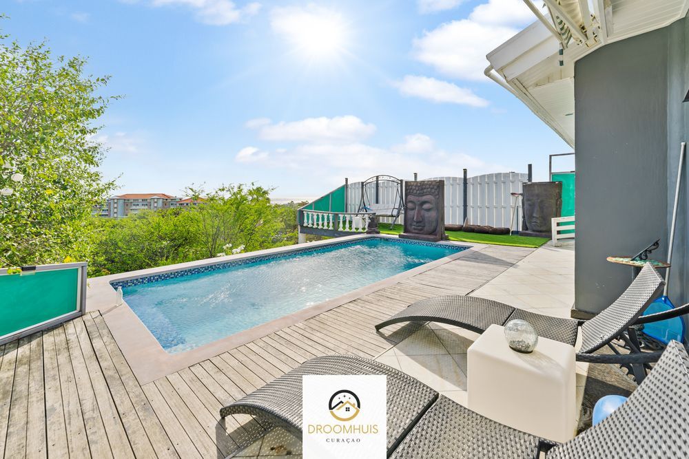 Spacious villa with stunning sea view for sale at Piscadera Bay Resort, Curaçao – luxury living in an exclusive area with a private pool and direct access to beaches